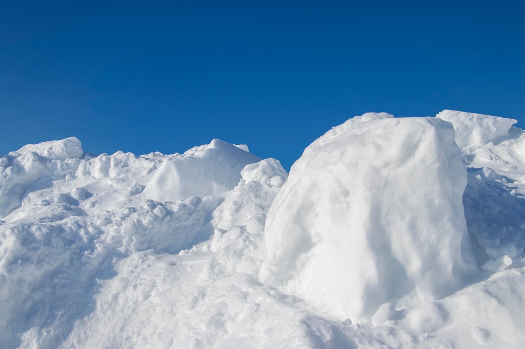 How Snow Piles Can Negatively Affect Your Commercial Property